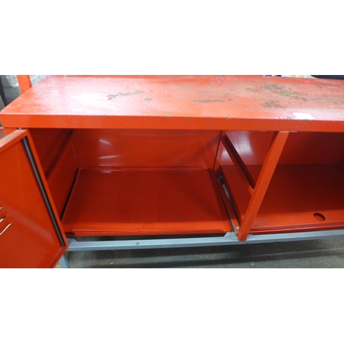 2215 - A red metal two door lockable tool bench (120 x 37 x 63cm)