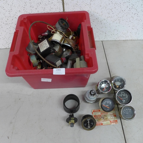 2361 - A box of classic car parts including oil gauges, speedometers and heater temperature gauges (approx.... 