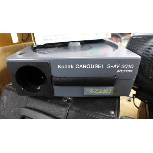 2388 - An assortment of electronic items including a Kodak carousel S-AV 2010 projector, a Pye Audio CC3420... 