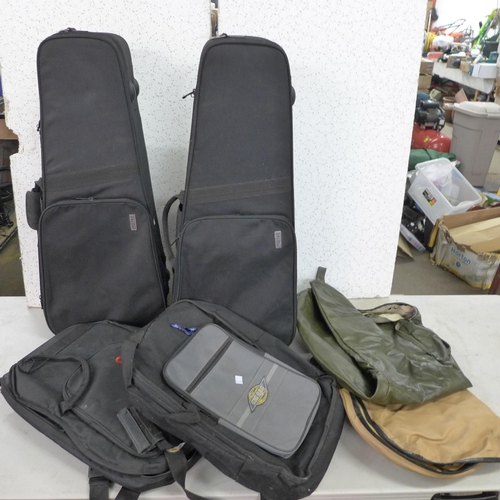 2397 - 6 Musical instrument cases; 4 guitar and 2 violin