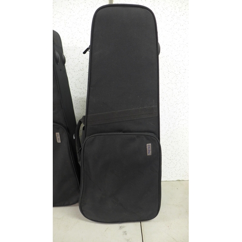 2397 - 6 Musical instrument cases; 4 guitar and 2 violin