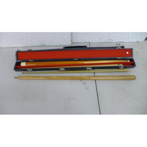 2399 - 2 Riley pool/snooker cues one in soft case, one in a hard case