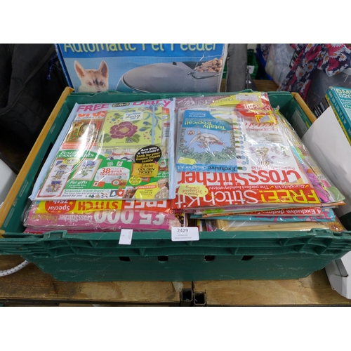 2429 - A basket of approx. 75 cross stitch magazines