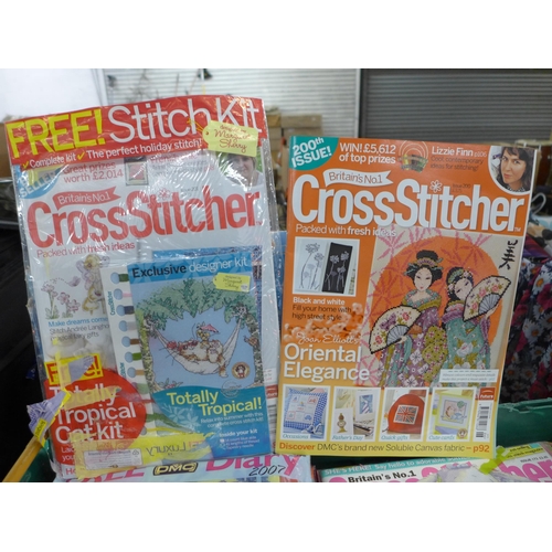 2429 - A basket of approx. 75 cross stitch magazines