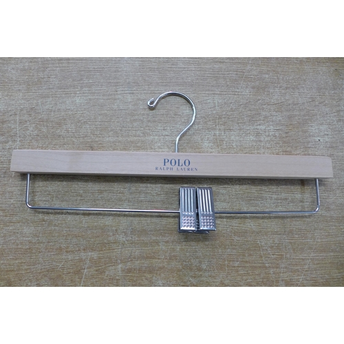 2441 - A box of approx. 80 wood ad metal Ralph Lauren Polo coat hangers