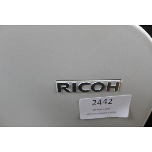 2442 - A Ricoh SP (C250DN) printer with spare cartridge power cable