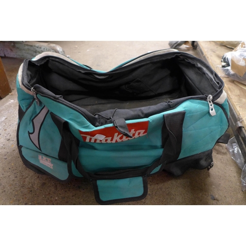 2450 - A Makita LXT tool bag with 3 tool handles