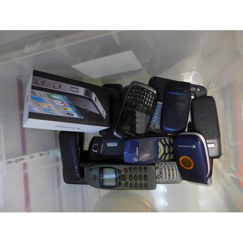 2101 - A box of 18 retro mobile phones including iPhone, Nokia, Sony, Samsung, Blackberry, etc.