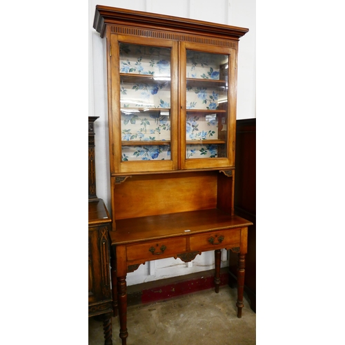 101 - A Victorian walnut pantry dresser