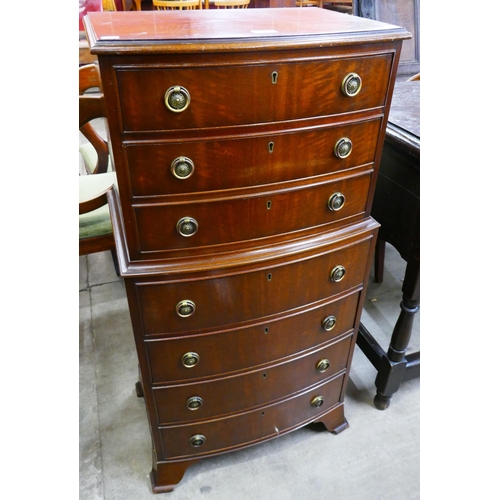 102 - A small George III style mahogany chest on chest