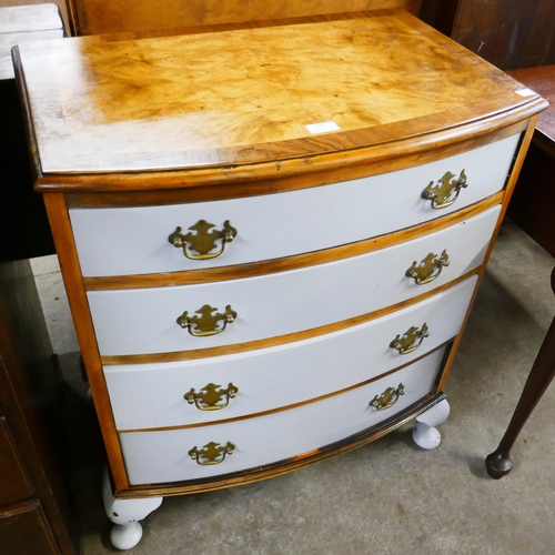 107 - A George III style painted walnut bow front chest of drawers