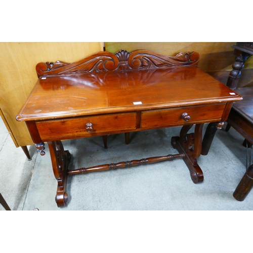 111 - A Victorian style hardwood two drawer wash stand