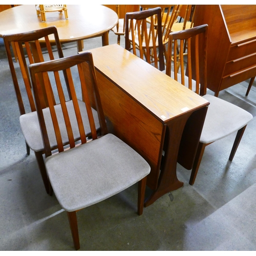 13 - A G-Plan Fresco teak drop-leaf table and four chairs