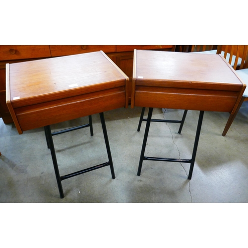 16 - A pair of single drawer bedsides on black tubular metal stands