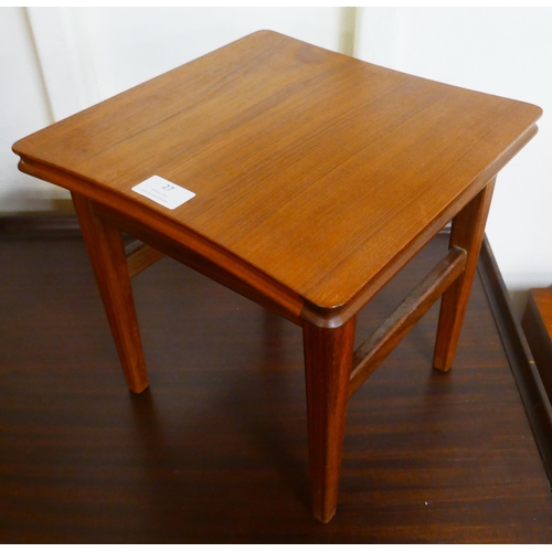 27 - A small teak occasional table