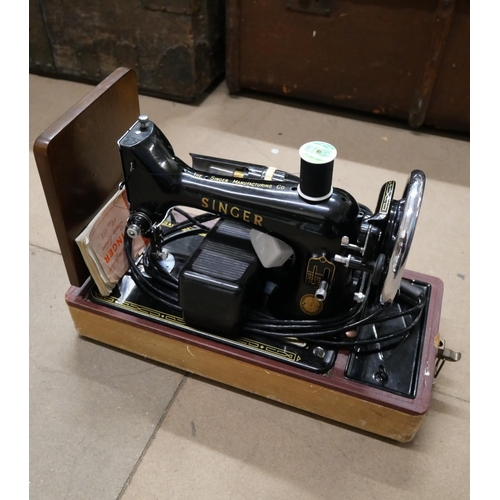 286 - A cased Singer sewing machine