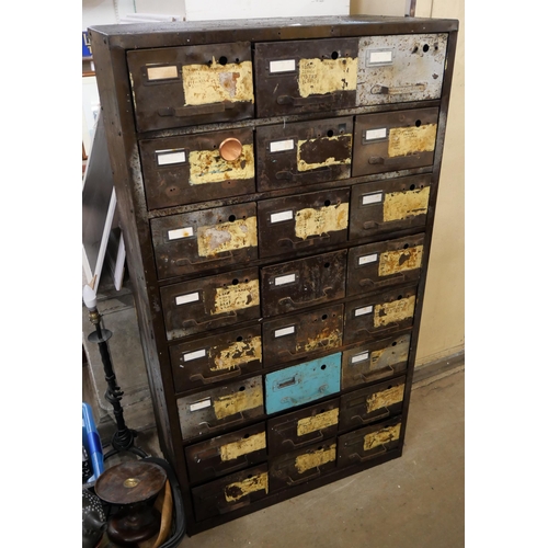 289 - An industrial green metal filing twenty four drawer cabinet