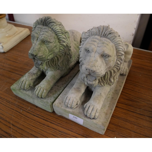 290 - A pair of concrete garden figures of recumbent lions