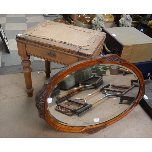 293 - An Edward VII oak framed oval mirror and a stool