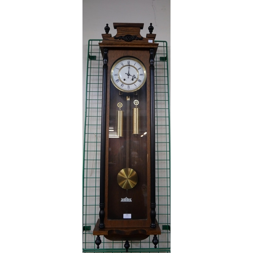 296 - A 19th Century style walnut double weight Vienna wall clock