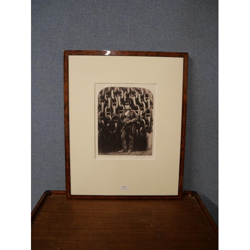 303 - Two black and white photographic prints of Victorian figures, framed