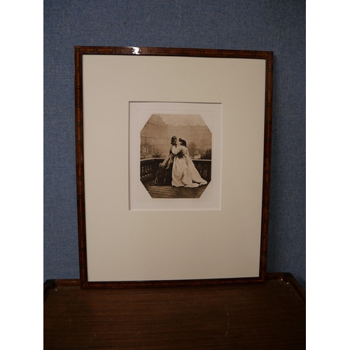 303 - Two black and white photographic prints of Victorian figures, framed