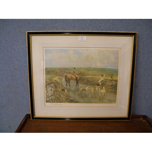 313 - Two signed Lionel Edwards fox hunting scene prints, framed