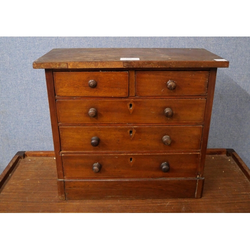 339 - A Victorian miniature mahogany chest of drawers