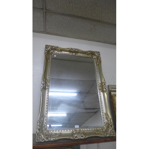 351 - A Victorian style gilt framed mirror