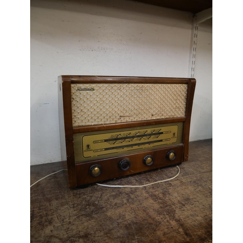 362 - A walnut Masteradio Ltd., London radiogram