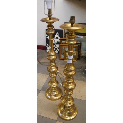 380 - A pair of tall brass table lamps