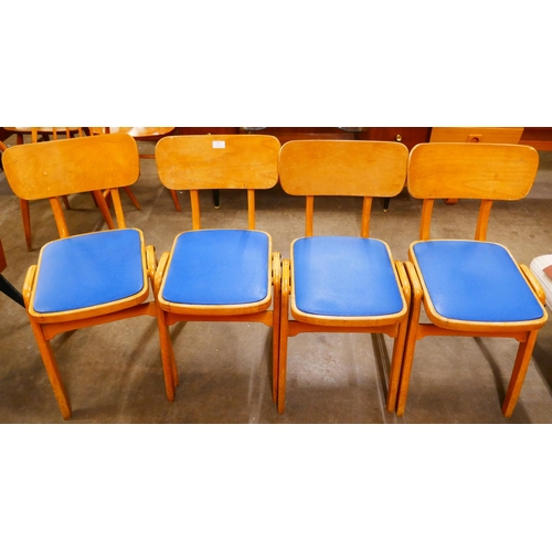 43 - A set of four West German Centa beech stacking chairs