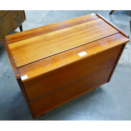 53 - A small teak cocktail cabinet