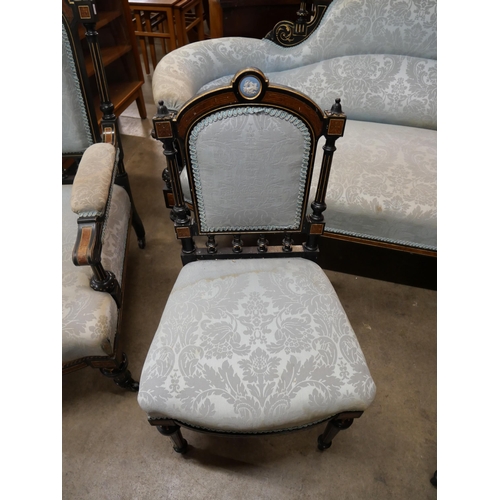 70 - A Victorian ebonised, amboyna and blue fabric upholstered seven piece salon suite, set with Wedgwood... 