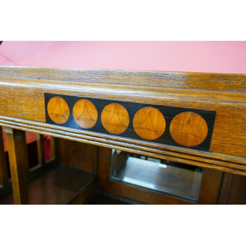 74 - A Secessionist inlaid oak bookcase