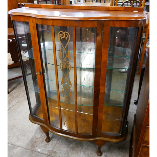 86 - A walnut display cabinet