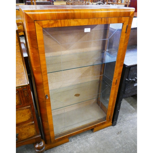 88 - A walnut display cabinet