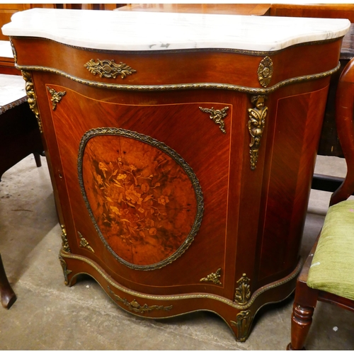 94 - A French Louis XV style inlaid mahogany and walnut serpentine marble topped pier cabinet