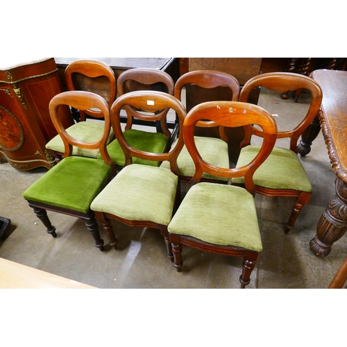 95 - A Harlequin set of seven Victorian mahogany balloon back dining chairs