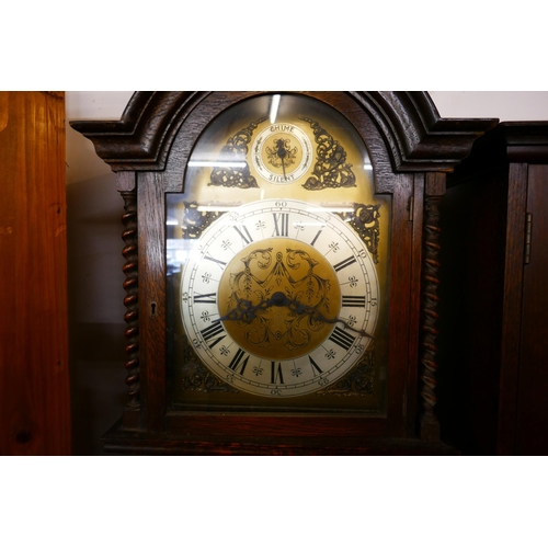 97 - An early 20th Century oak triple weight longcase clock