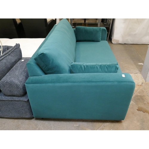 1314 - A turquoise velvet three seater sofa