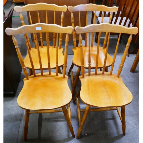 80 - A set of four beech spindle back kitchen chairs