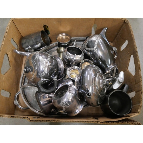 1135 - A box of mixed silver plate and a single silver candlestick, a four piece silver plated tea service ... 