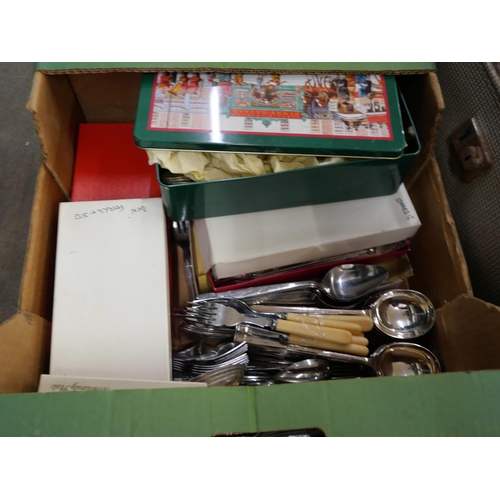 1135 - A box of mixed silver plate and a single silver candlestick, a four piece silver plated tea service ... 