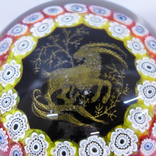 627 - A Murano glass paperweight