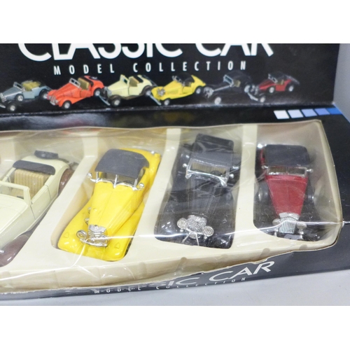 670 - A set of six small classic car models and six individual model vehicles