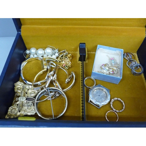 675 - A jewellery box and vintage costume jewellery including some silver (in silver cabinet)