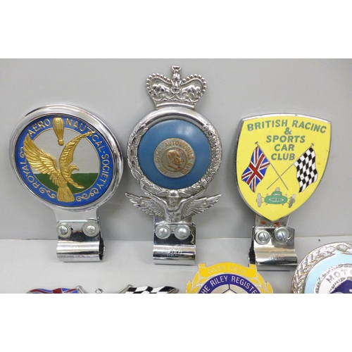 680 - A collection of seven car badges, Riley x3, Royal Aeronautical Society, British Racing and Sports Ca... 