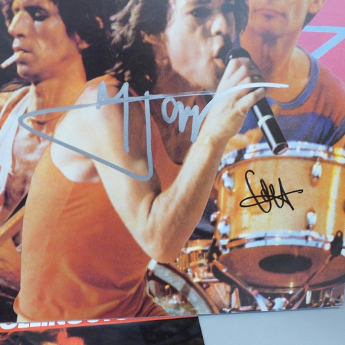 692 - A signed Rolling Stones LP record, Still Life, with additional backstage road crew stickers and a 19... 