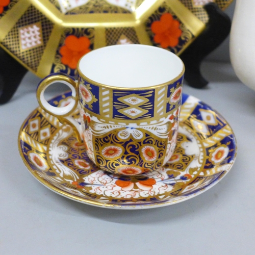 698 - A Royal Crown Derby octagonal 1128 Imari plate, second, a Crown Derby cup and saucer and an Imari ju... 